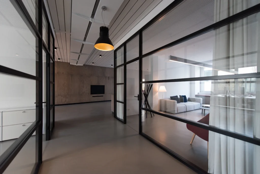 Office corridor with glass walls in a commercial building